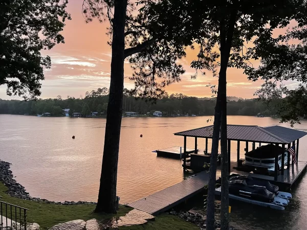 Boathouse and dock at sunset on Lake Martin