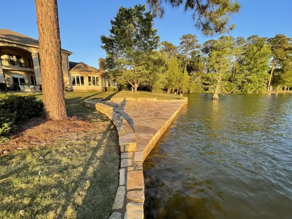 Seawall and patio at sunset