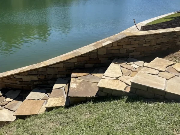 Stone steps going down to Lake Martin and fire pit