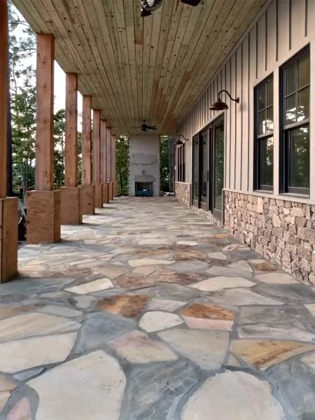 Decorative stone porch with fireplace