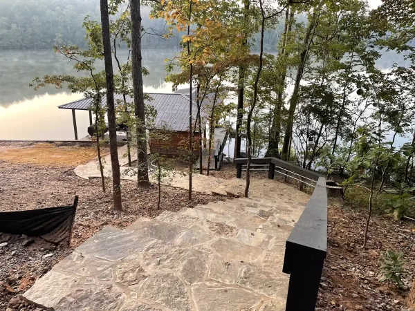 Stone stairs going down to Lake Martin boathouse